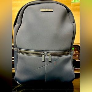 For work and play this versatile navy blue back pack can hold it all!